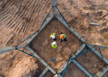 workers in a building foundation
