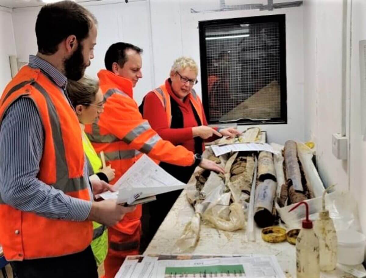 Engineers inspecting soil samples